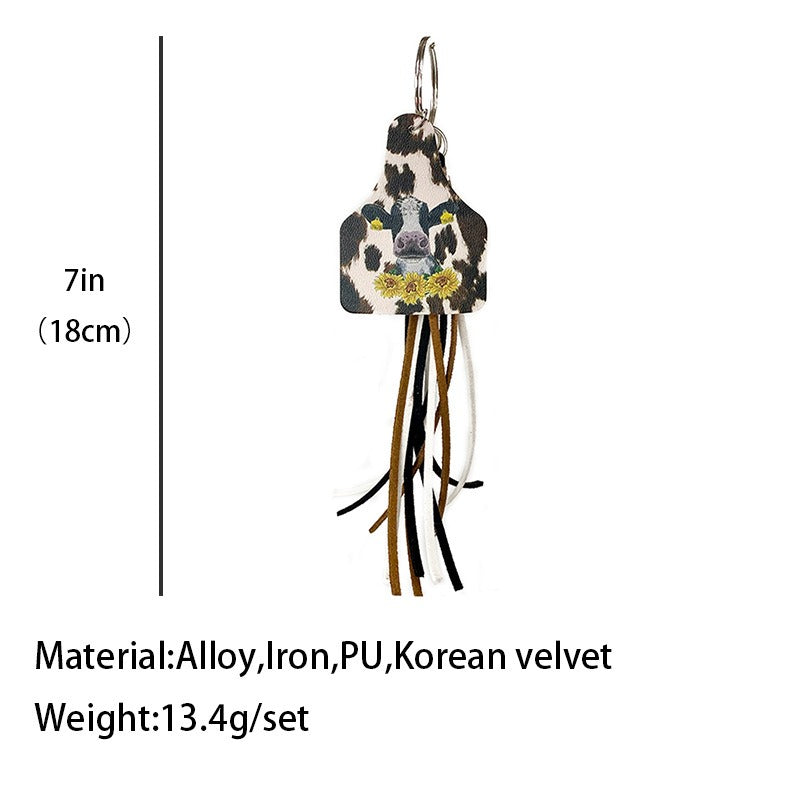 Llavero de cuero de estilo occidental con diseño de girasol y leopardo, borla de cuero de vaca de marca, joyería popular hecha a mano